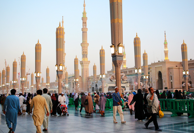 Non-Muslim guests respecting prayer times and cultural norms throughout Ramadan