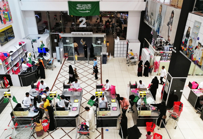 Foreign travelers learning about appropriate public behavior during Ramadan